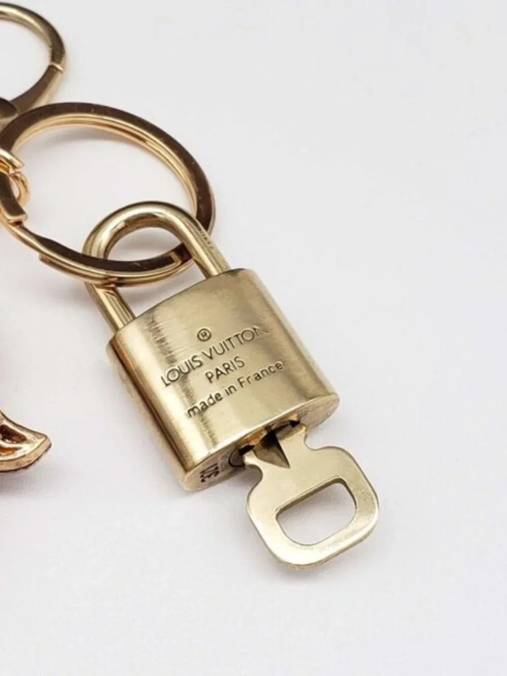 Louis Vuitton Gold Lock 🔑 Authentic LV Padlock + Bag Unbranded Evil Eye Charm